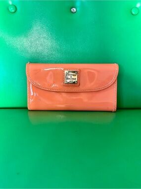 Dooney & Bourke Coral Orange Patent Leather Wallet with Logo Plaque